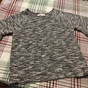 LOFT Small black and white boucle top with trumpet sleeves.